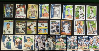 Shows a sample of possible cards in a Yankees team pack, 25 total baseball cards spread out in three rows.